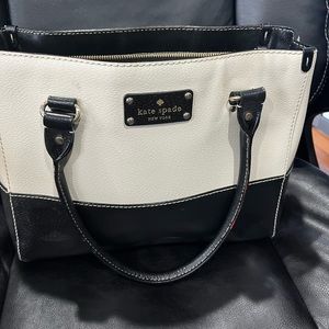 Kate Spade black and white clutch bag with matching wallet.